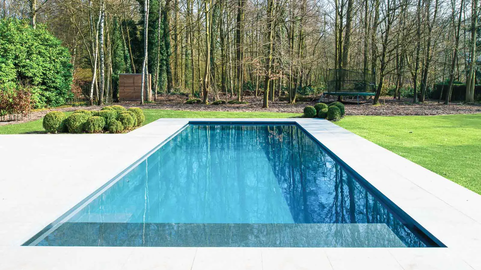 The Cube, a fiberglass pool with a high water line and cover box